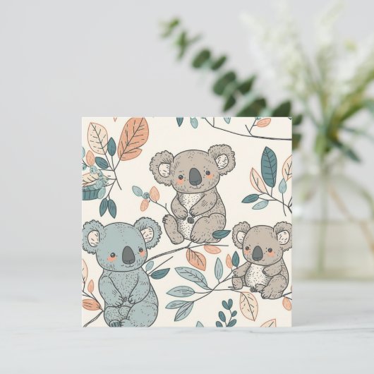 Koalas dans la crèche en fleurs carte plat (Debout devant)