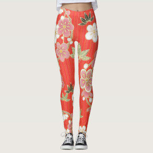 Koel verschillende kleurenbloemen op oranje achter leggings