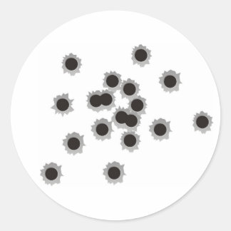 Kogelopeningen van een geweer of pistool, eventuee ronde sticker