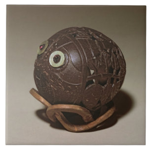 Kokosnoot in een gezicht gesculpeerd, c.1895 tegeltje