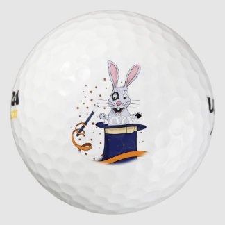 Konijn met top-pet en toverstaf golfballen