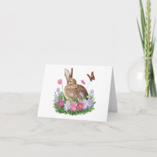 Konijn met vlinder en bloemenveld kaart