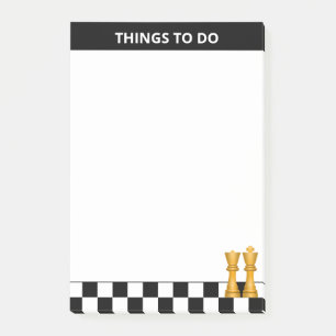 Koningin & koning over zwarte en witte schaafdinge post-it® notes