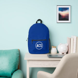 Koninklijk blauwe en witte schoolkleuren en letter bedrukte rugzak