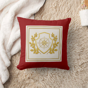 Koninklijk gouden kompas crest en laurier op karmo kussen