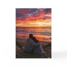 Koppel aan de oceaan bij zonsondergang - Valentijn