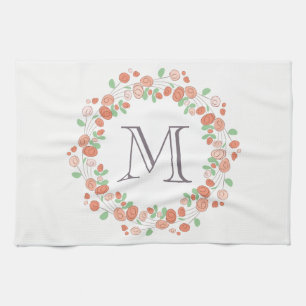 koraal roos met baarmoedermonogram theedoek