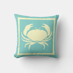 KRAB, off wit op blauw kussen