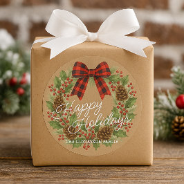 Krans van hulst met rode en zwarte geruite strik ronde sticker