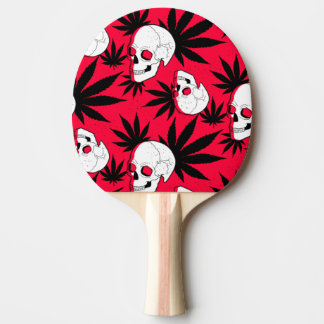 Kruidenplant en schedels op rood tafeltennisbatje