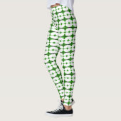Kunst deco-elementen in diep groen leggings (Links)