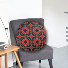 kunstdecopatroon in rood en zwart rond kussen