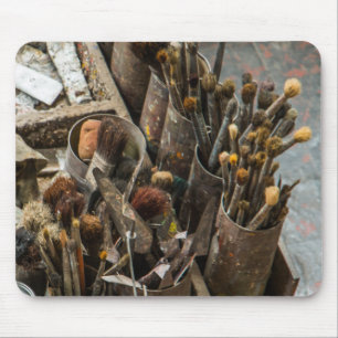 Kunstschilderpenselen en verf in oud Hoesje van ho Muismat