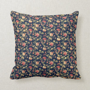 Kussen met vintage rozen op een blauwe achtergrond