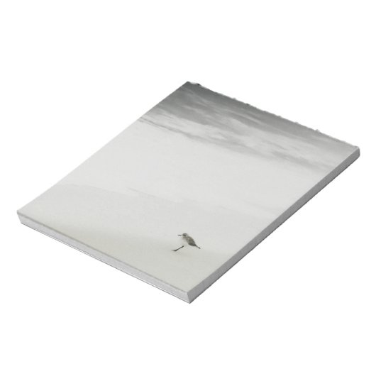 Kustzandloper op het strand notitieblok (Gedraaid)