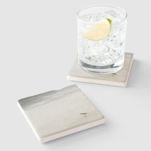 Kustzandloper op het strand stenen onderzetter (Zijkant)