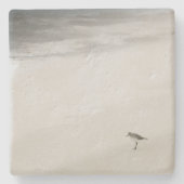 Kustzandloper op het strand stenen onderzetter (Voorkant)