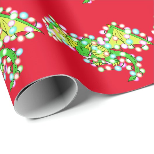 Kute kerstdraak ingepakt in licht cadeaupapier (Rol Hoek)