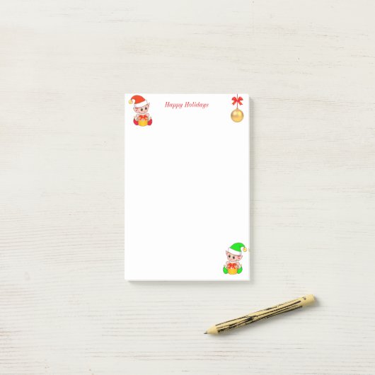 Kute kerstkleppen op wit post-it® notes (Op bureau)