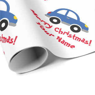 Kute kind blauw speelgoed op kerstavond cadeaupapier