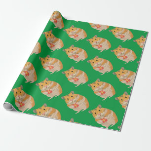 Kute kleine hamster met een kerstcadeautje cadeaupapier