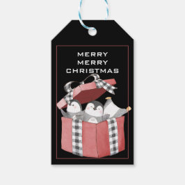 Kute pinguïns in de rode kersttas cadeaulabel