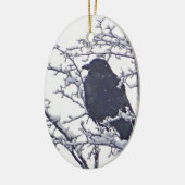 Kute zwarte vogel in sneeuwtakken keramisch ornament (Links)