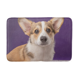 Kutest Baby Animals Corgi Puppy op Paars Badmat