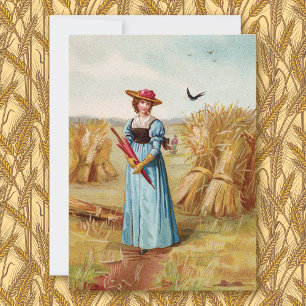 La carte de la femme dans le champ de blé