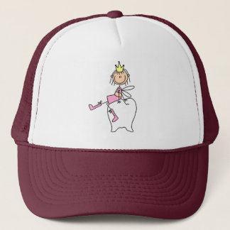 La fée de dent s'assied sur un casquette de dent