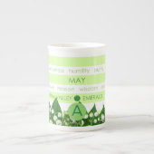 La fleur de naissance et la tasse de rayure de (Devant)