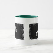 La frontière affligée 2 a dégrossi tasse de (Centre)