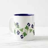 La gloire de matin fleurit la tasse florale de (Devant gauche)