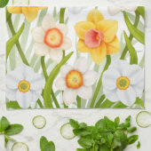 La jonquille de ressort fleurit la serviette de (Plié)