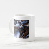 La moule écosse la tasse (Devant gauche)