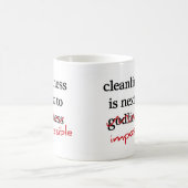 La "propreté est à côté" des tasses impossibles (Centre)