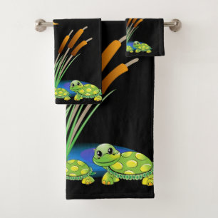 La serviette de salle de bains place des tortues