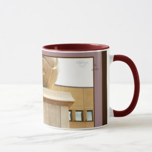 La sphère de la colonne et la tasse rouge de thé