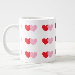 La tasse à café Valentine aux coeurs rose et rou