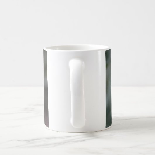 la tasse de café avec des papillons… prêchent le (Poignée)