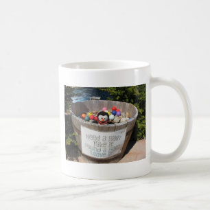 La tasse de café de mise de pingouin