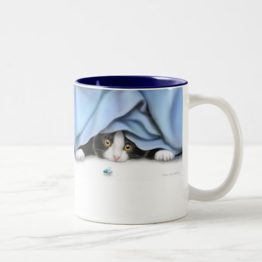 La tasse de jouet de chat de vol (Droit)