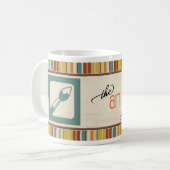 La tasse de MEMBRE de groupe d'artisan (artistes) (Devant gauche)