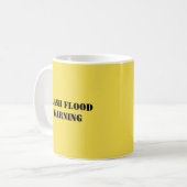 La tasse drôle indique le "AVERTISSEMENT de CRUE (Devant gauche)