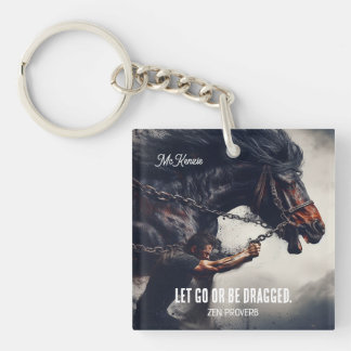 "Laat gaan of worden gesleept" en krachtig paard Sleutelhanger
