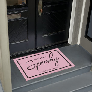 Laat ons tot speky moderne roze en zwarte hallowee deurmat