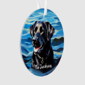 Labrador noir dans l'eau (devant)