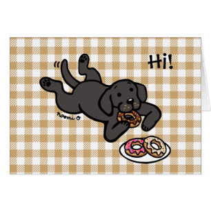Labrador noir et beignets pensant à vous