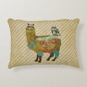 Lama d'or et coussin bleu de hibou