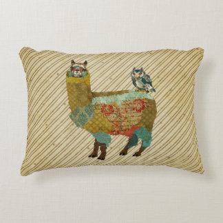 Lama d'or et coussin bleu de hibou